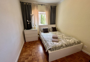 Double bed room with shared bathroom